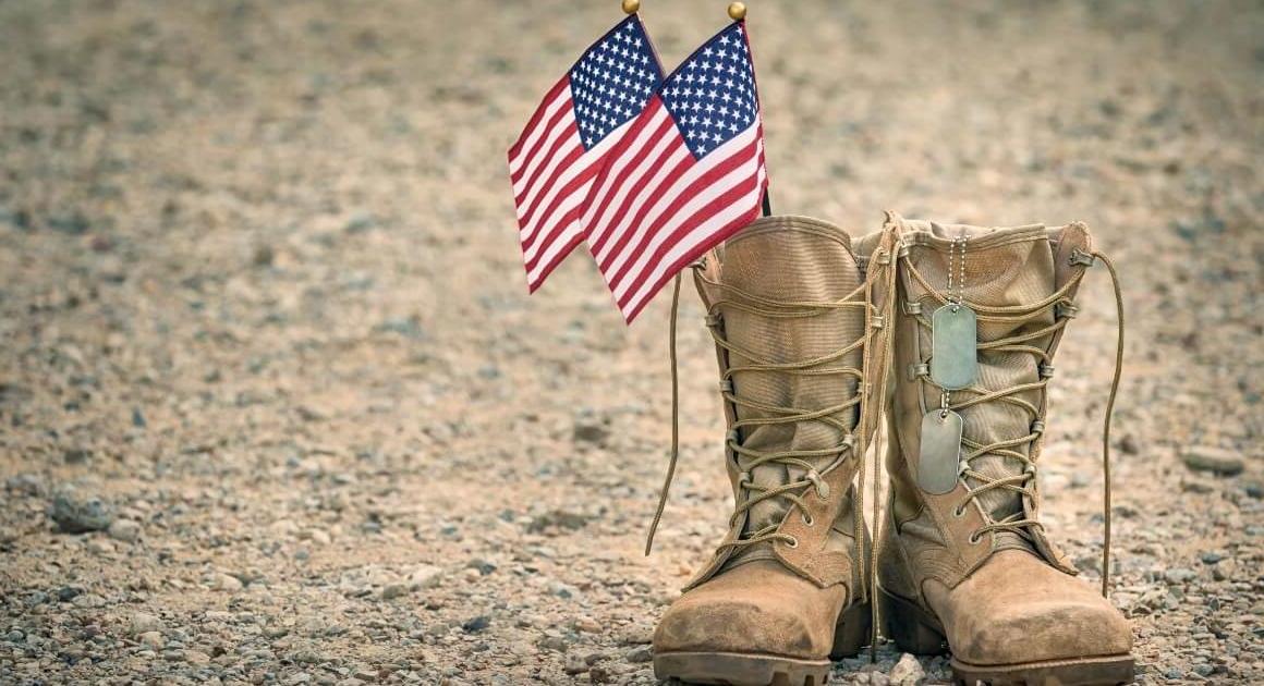 American flags in a pair of military boots